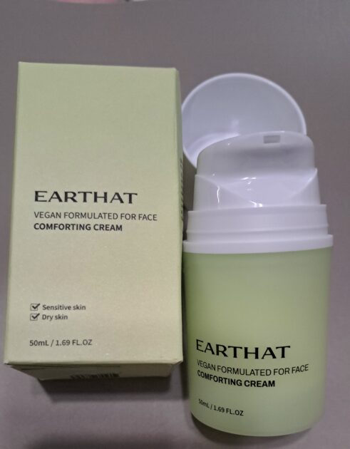 Earthat comforting cream box and pump containter.